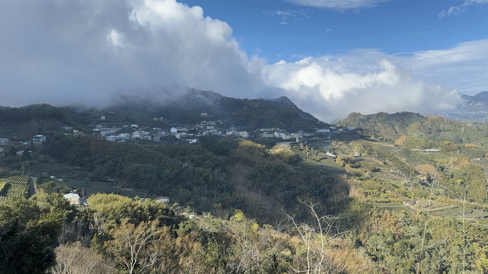 Clouds rolling over the hills in Xiding, TW
